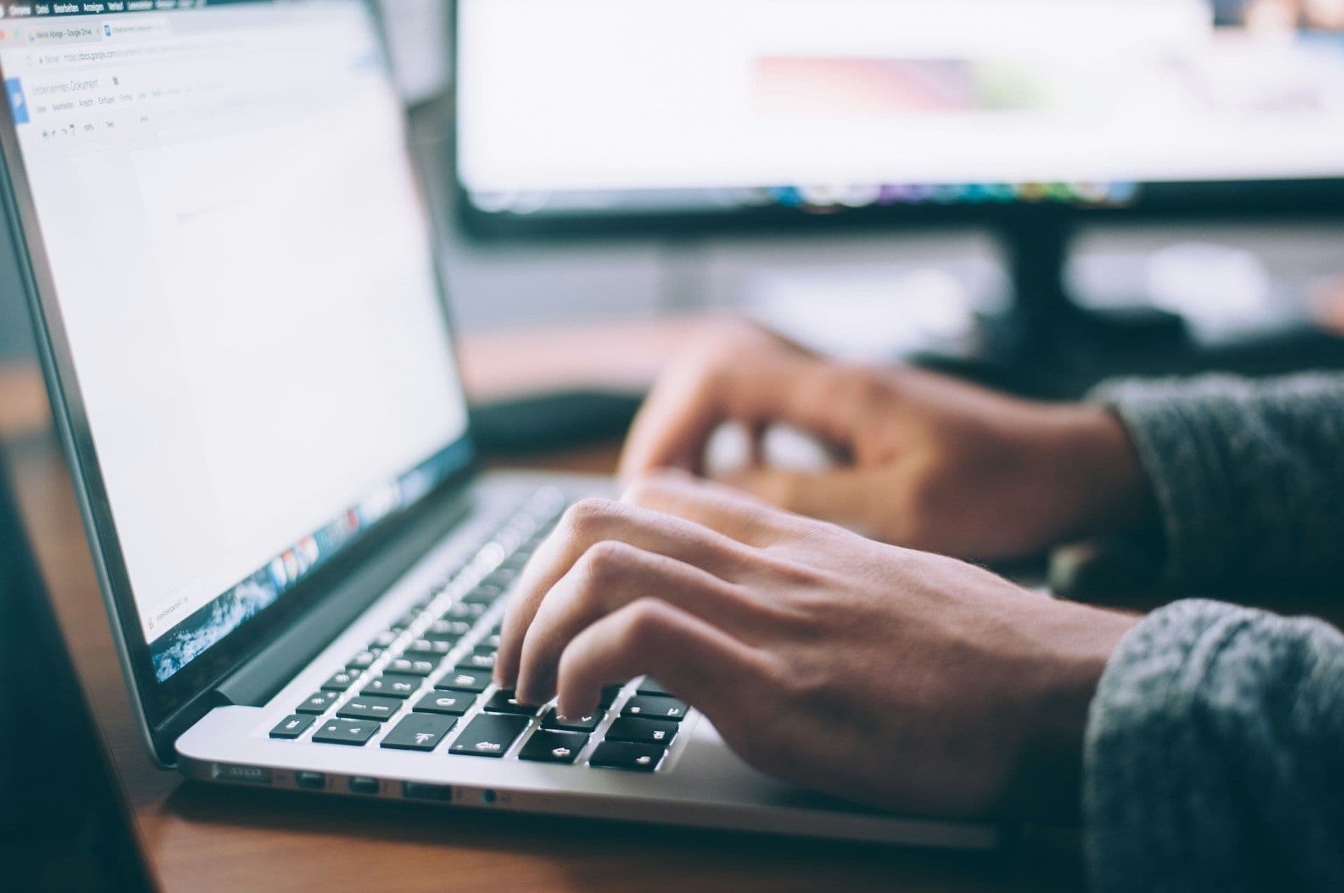 Laptop in warm light — online therapy across borders